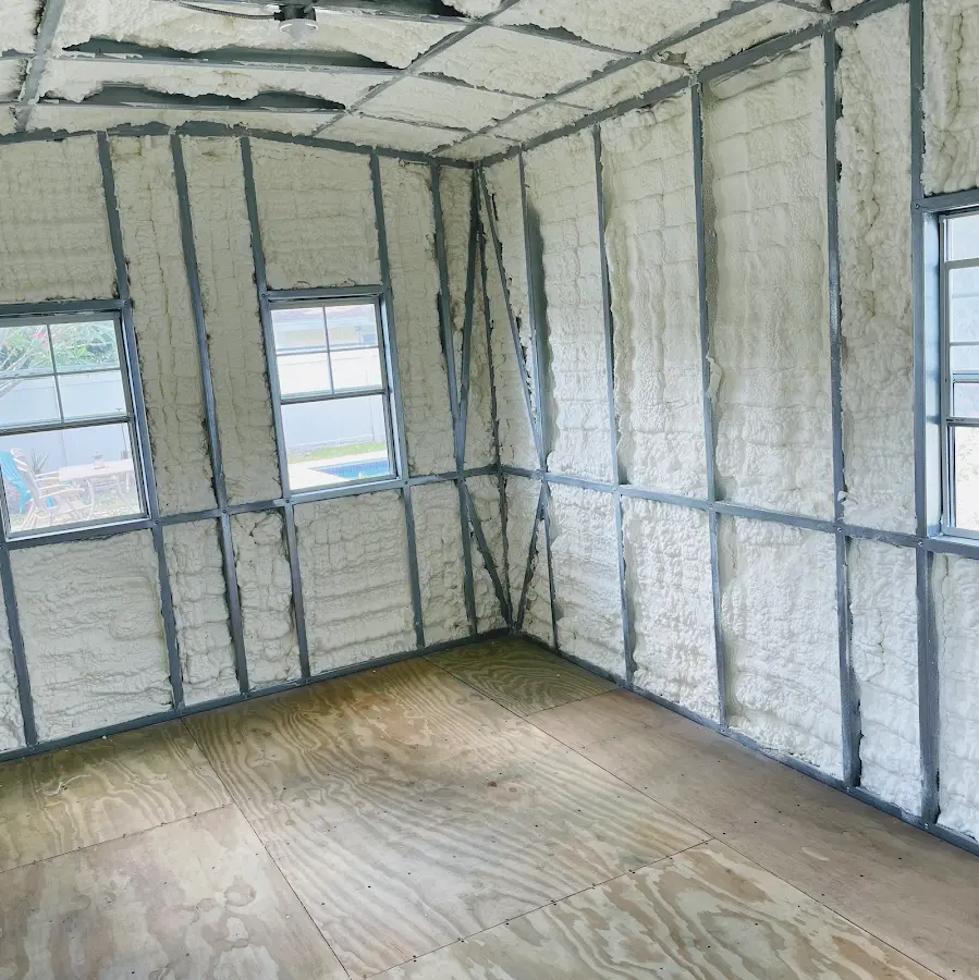 Closed-cell spray foam insulation applied to wall cavities in a residential project in Lakeland North